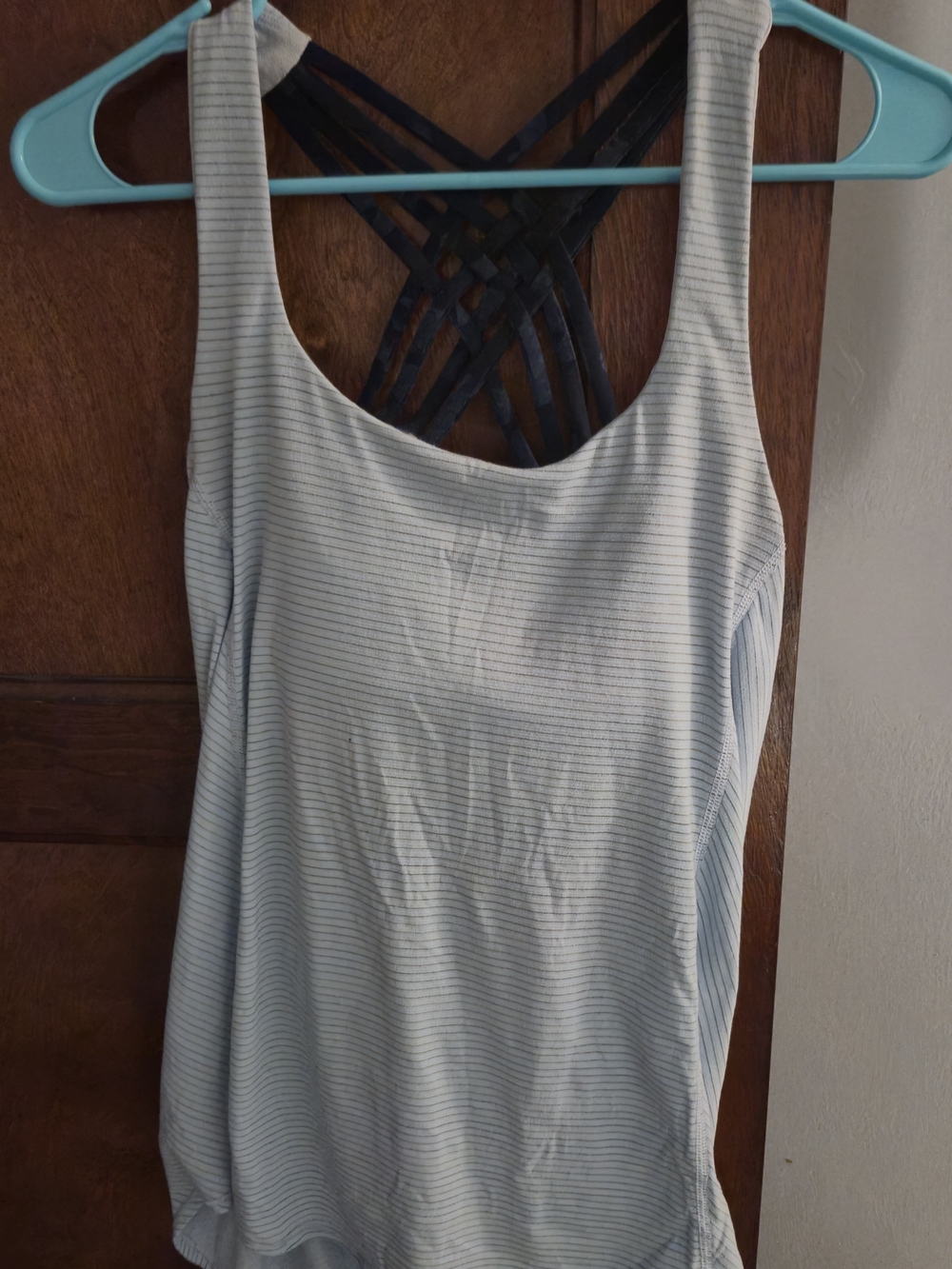 Lululemon Free To Be Wild 2-in-1 Tank, which features a striped body panel over